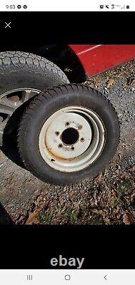 Ford new holland 2010 4 x 4 tractor front rim and tire